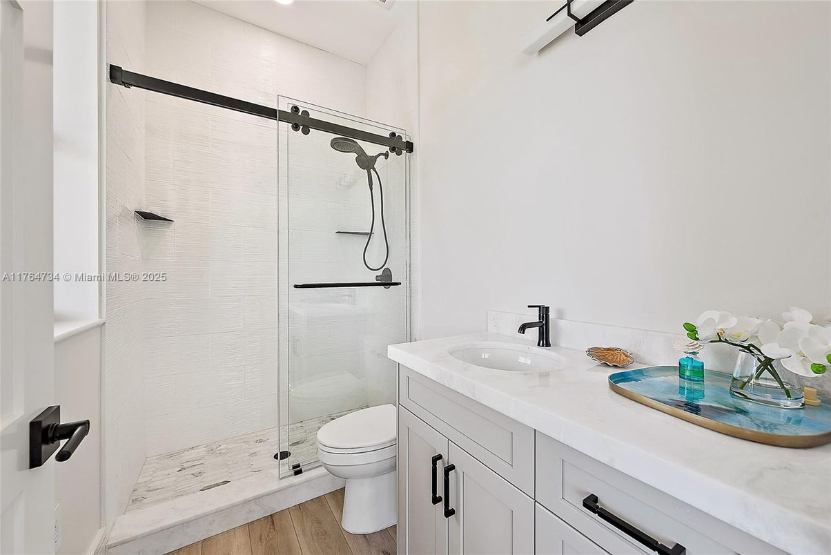 Bathroom, Glass Shower, Interior, Recessed Lighting, Wood Texture Flooring