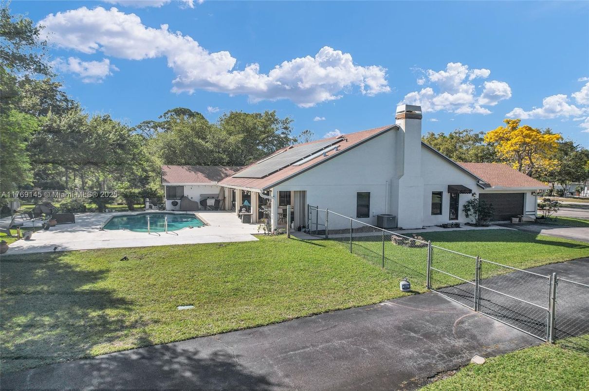 Exterior, Pool, Solar Panels