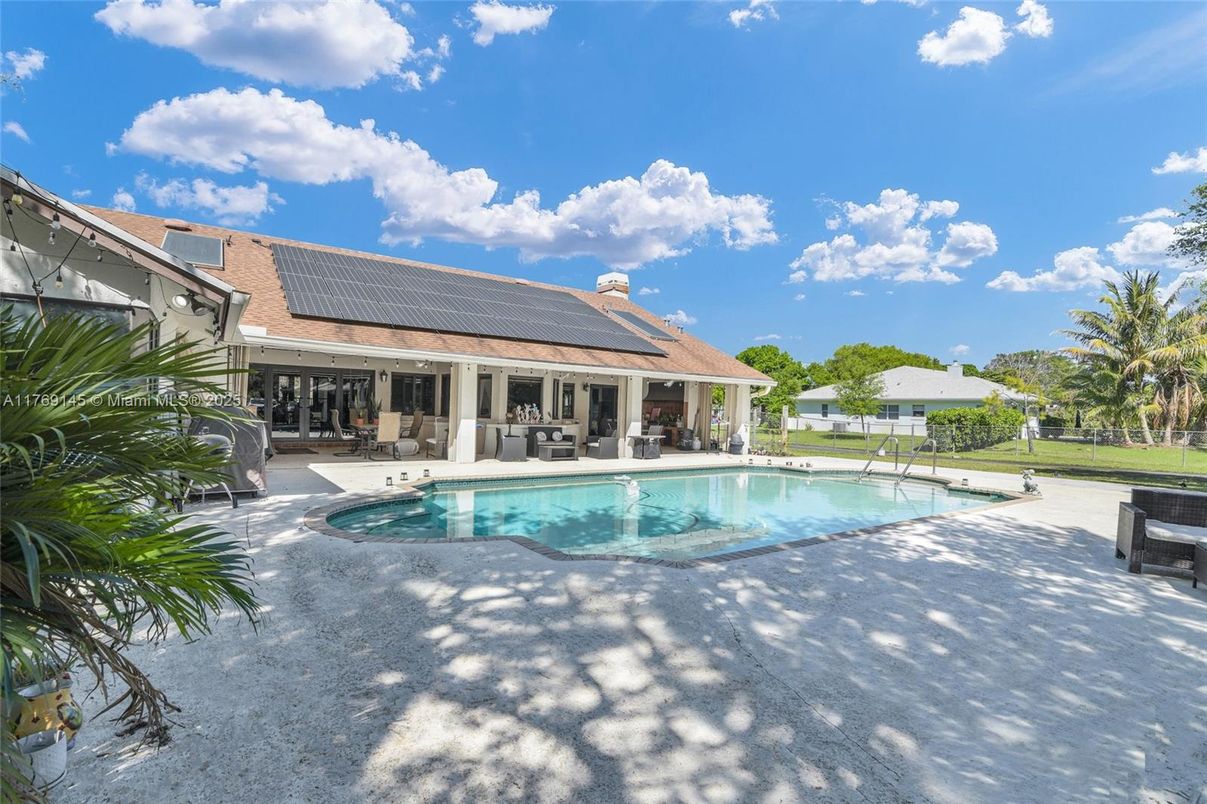 Exterior, Pool, Solar Panels