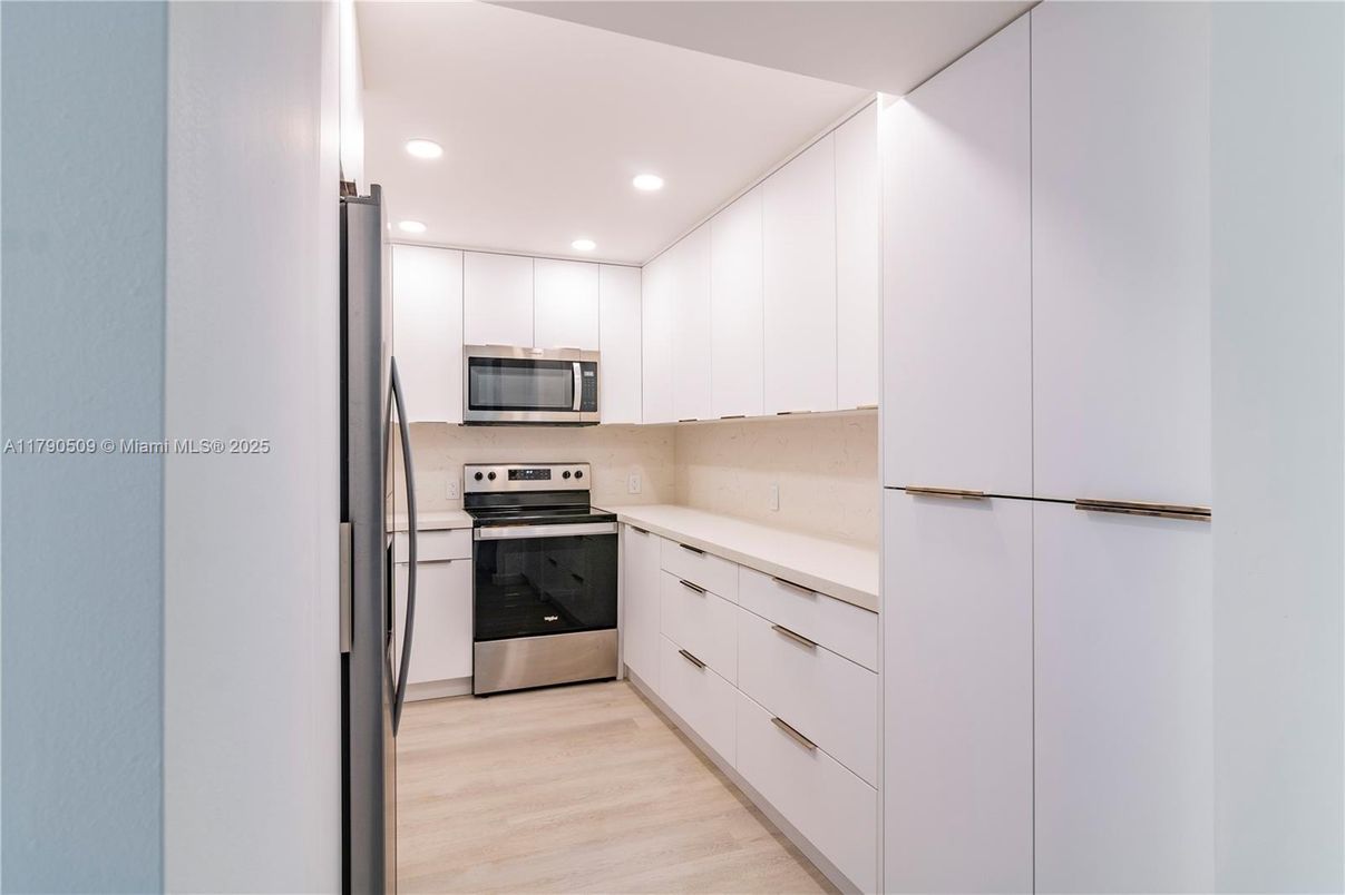 Interior, Kitchen, Recessed Lighting, Stainless Steel Appliances, Wood Texture Flooring
