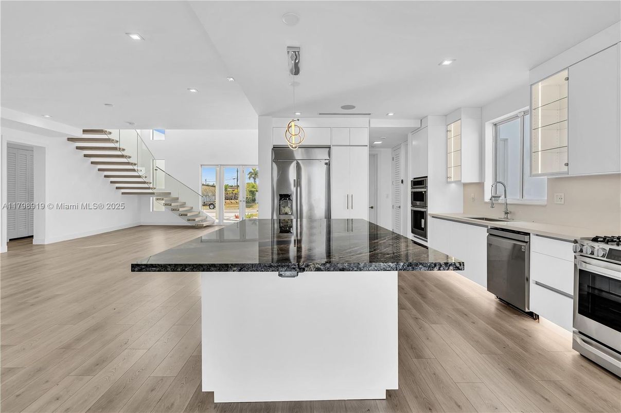 Interior, Kitchen, Pendant Lights, Recessed Lighting, Stainless Steel Appliances, Wood Texture Flooring