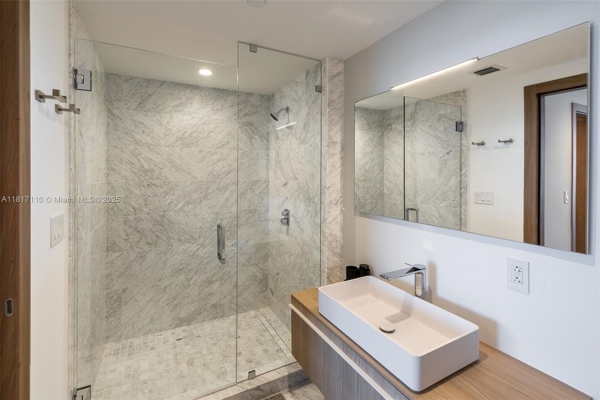 Bathroom, Glass Shower, Interior, Marble Walls, Recessed Lighting, Wood Texture Flooring