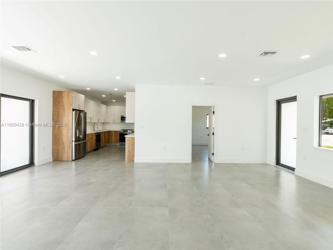 Empty room, Interior, Kitchen, Recessed Lighting, Stainless Steel Appliances