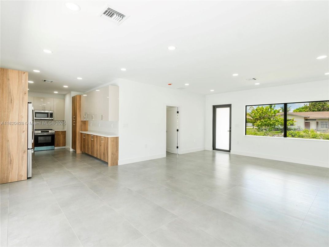 Empty room, Interior, Kitchen, Recessed Lighting, Stainless Steel Appliances