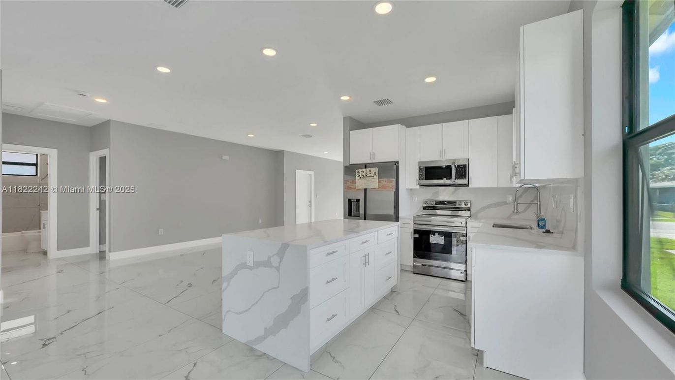 Interior, Kitchen, Marble, Recessed Lighting, Stainless Steel Appliances