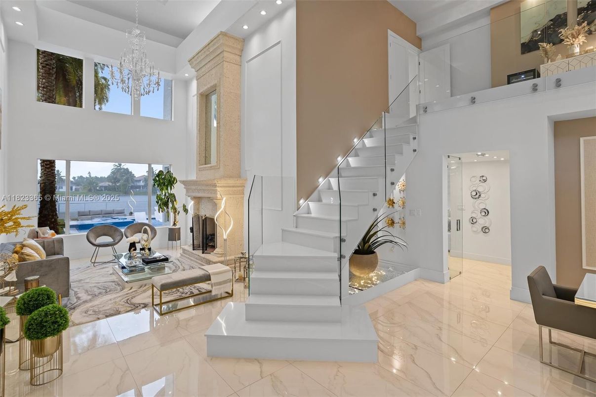 Chandelier, Fireplace, Interior, Living room, Marble, Recessed Lighting, Water