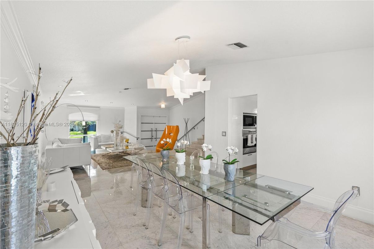 Chandelier, Dining room, Interior, Kitchen, Living room, Pendant Lights, Recessed Lighting, Stainless Steel Appliances