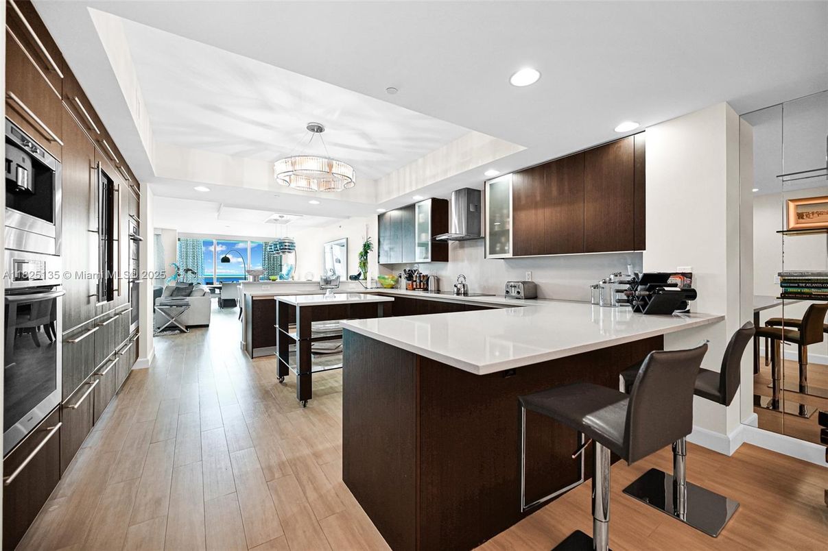 Chandelier, Interior, Kitchen, Recessed Lighting, Stainless Steel Appliances, Wood Texture Flooring