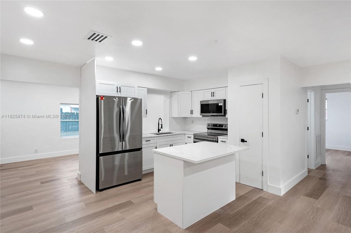 Interior, Kitchen, Recessed Lighting, Stainless Steel Appliances, Wood Texture Flooring