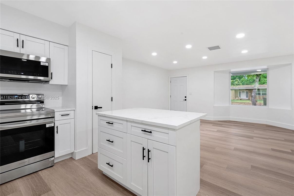 Interior, Kitchen, Recessed Lighting, Stainless Steel Appliances, Wood Texture Flooring