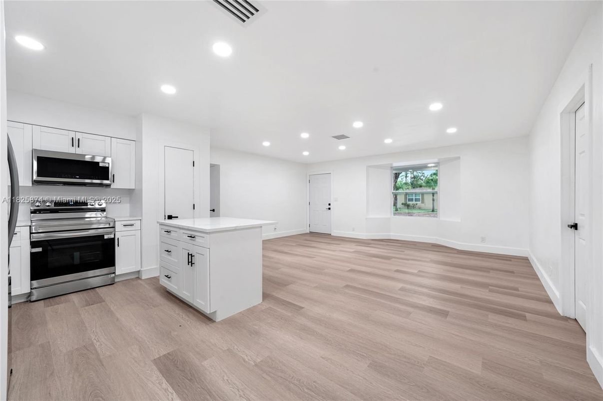 Interior, Kitchen, Recessed Lighting, Stainless Steel Appliances, Wood Texture Flooring