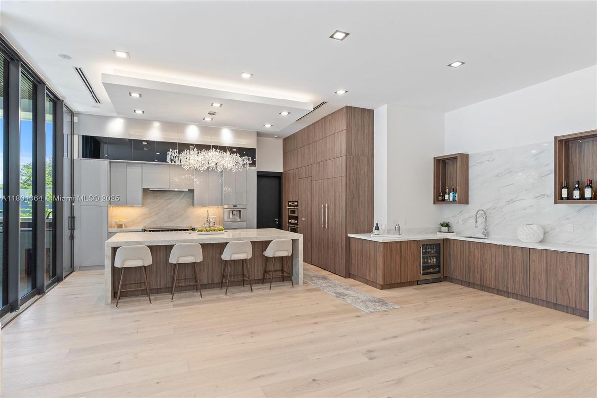 Interior, Kitchen, Marble Walls, Recessed Lighting, Stainless Steel Appliances, Wood Texture Flooring