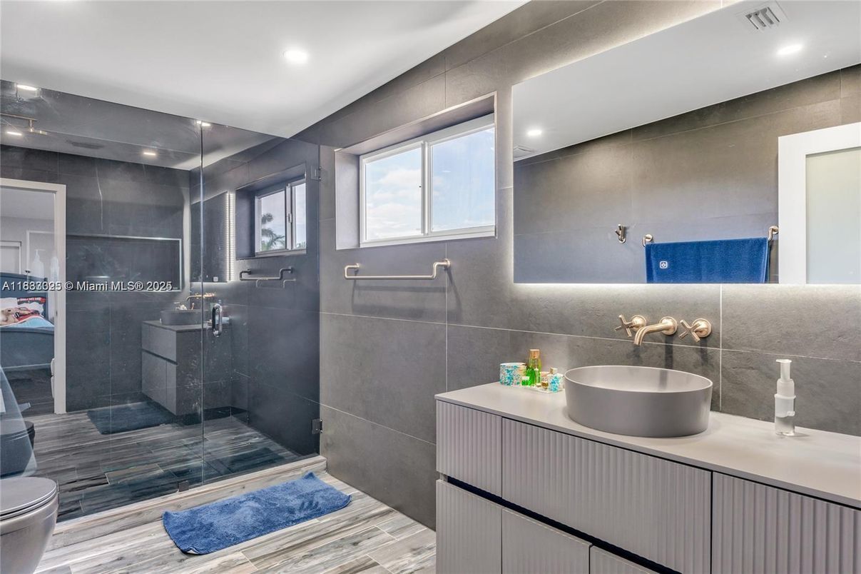 Bathroom, Dual Sink Vanities, Interior, Recessed Lighting, Wood Texture Flooring