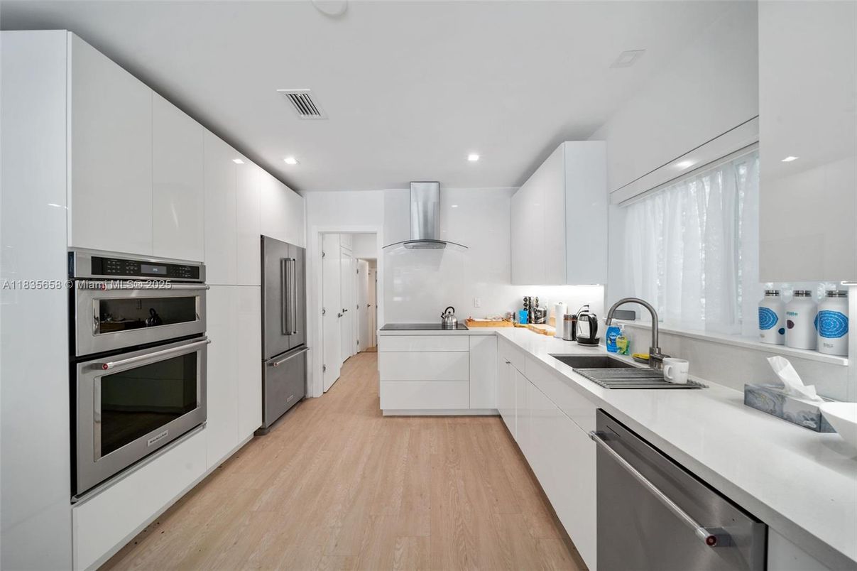 Interior, Kitchen, Recessed Lighting, Stainless Steel Appliances, Wood Texture Flooring