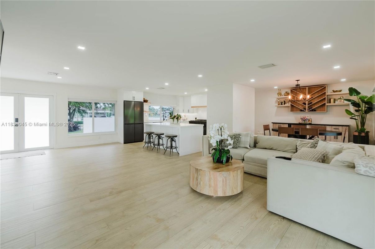 Dining room, Interior, Kitchen, Living room, Pendant Lights, Recessed Lighting, Stainless Steel Appliances, Wood Texture Flooring