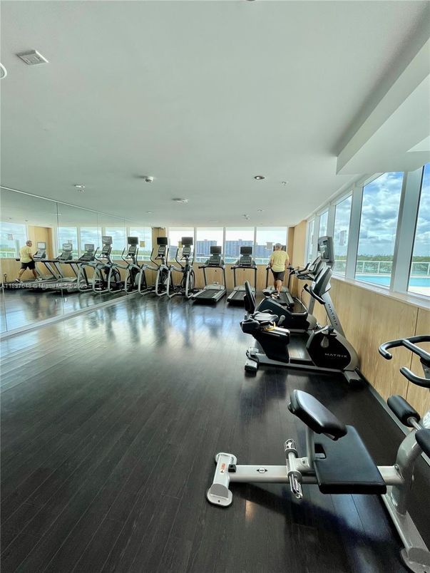 Fitness Equipment, Gym, Interior, Recessed Lighting, Water, Wood Texture Flooring