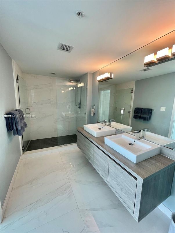 Bathroom, Dual Sink Vanities, Glass Shower, Interior, Marble, Marble Walls