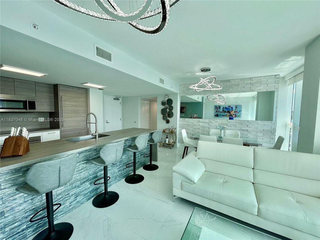 Dining room, Interior, Kitchen, Marble, Pendant Lights, Recessed Lighting, Stainless Steel Appliances