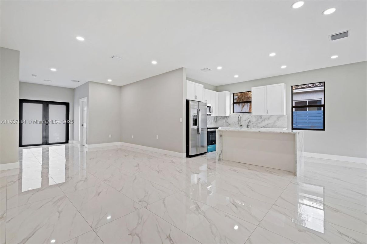 Interior, Kitchen, Marble, Marble Walls, Recessed Lighting, Stainless Steel Appliances