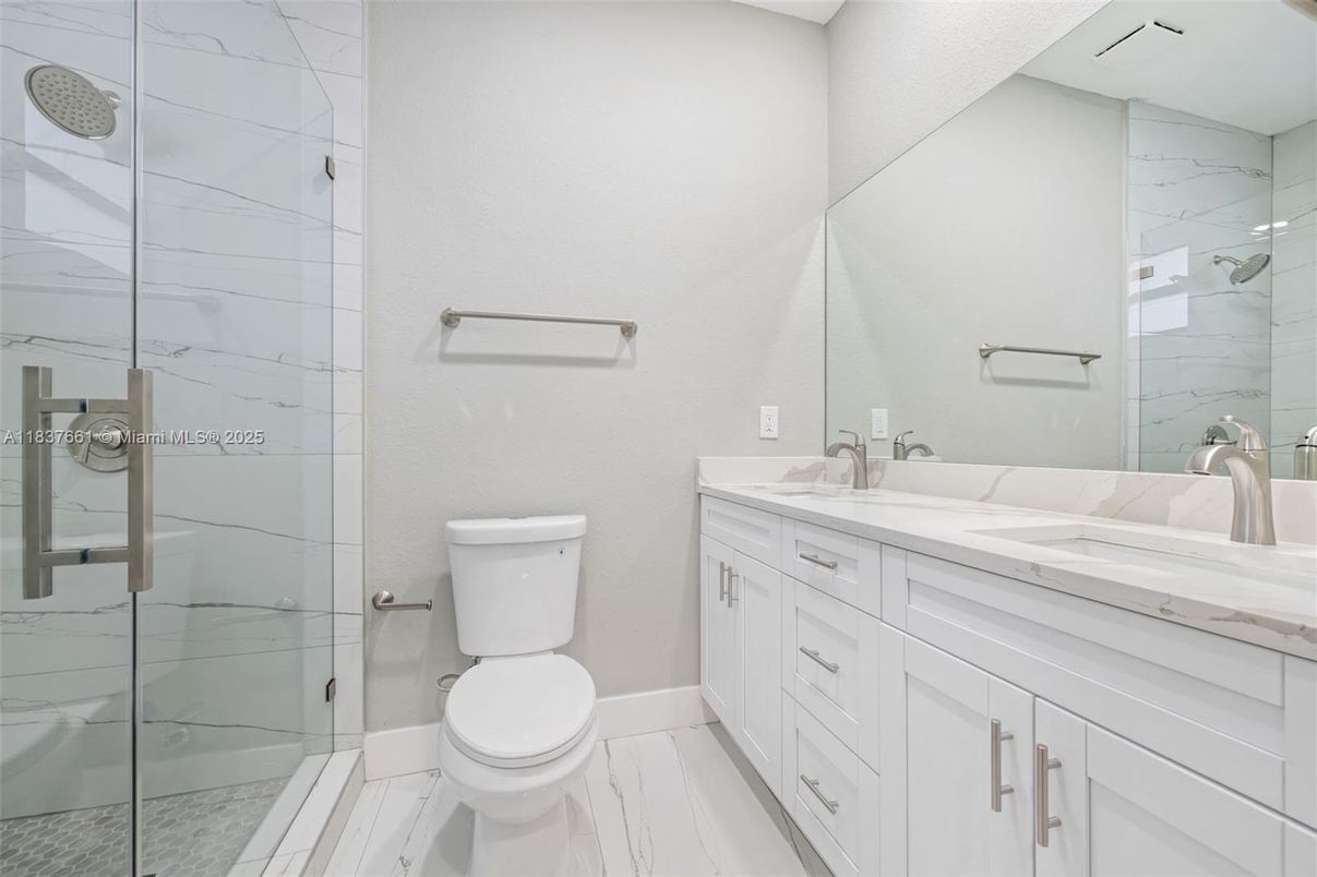 Bathroom, Dual Sink Vanities, Glass Shower, Interior, Marble, Marble Walls