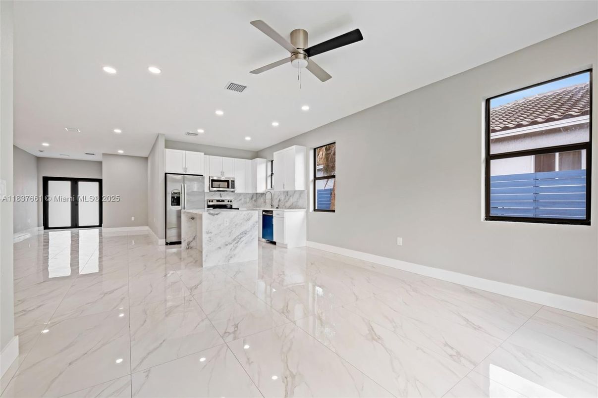Empty room, Interior, Kitchen, Marble, Recessed Lighting, Stainless Steel Appliances