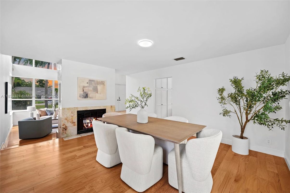 Dining room, Fireplace, Interior, Living room, Recessed Lighting, Wood Texture Flooring