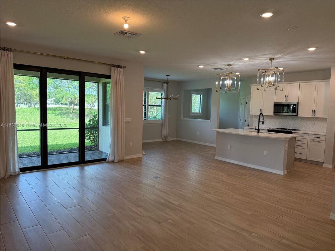 Chandelier, Empty room, Interior, Kitchen, Pendant Lights, Recessed Lighting, Wood Texture Flooring