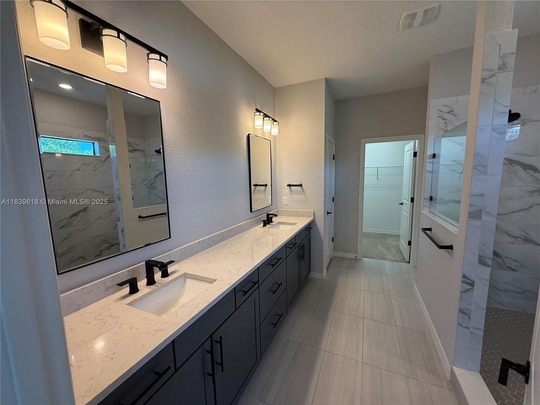 Bathroom, Dual Sink Vanities, Glass Shower, Interior, Marble Walls