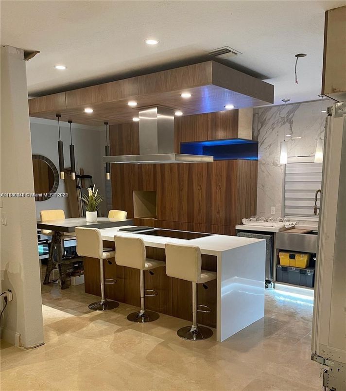 Dining room, Interior, Kitchen, Marble Walls, Pendant Lights, Recessed Lighting, Stainless Steel Appliances