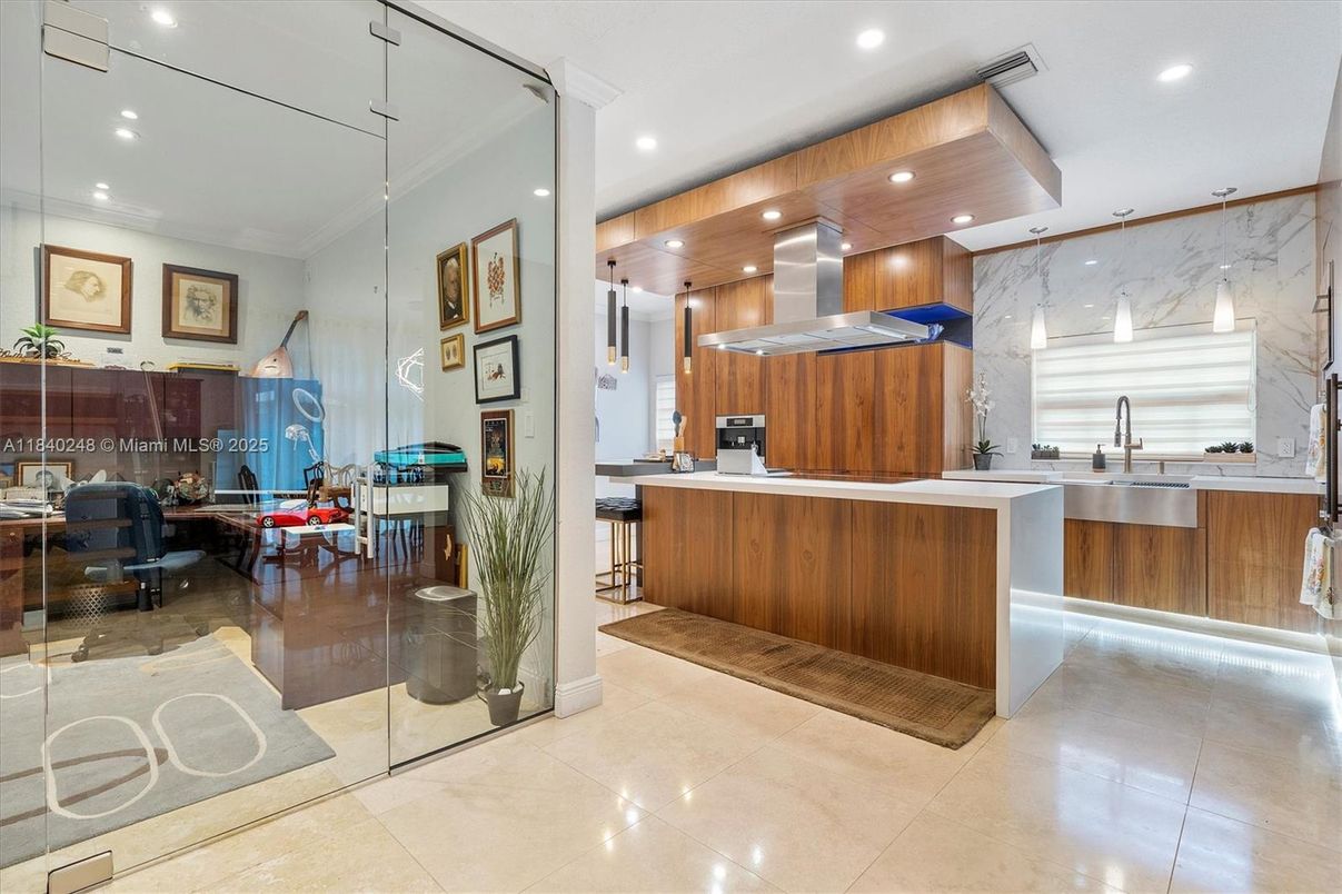 Interior, Kitchen, Marble Walls, Recessed Lighting, Stainless Steel Appliances