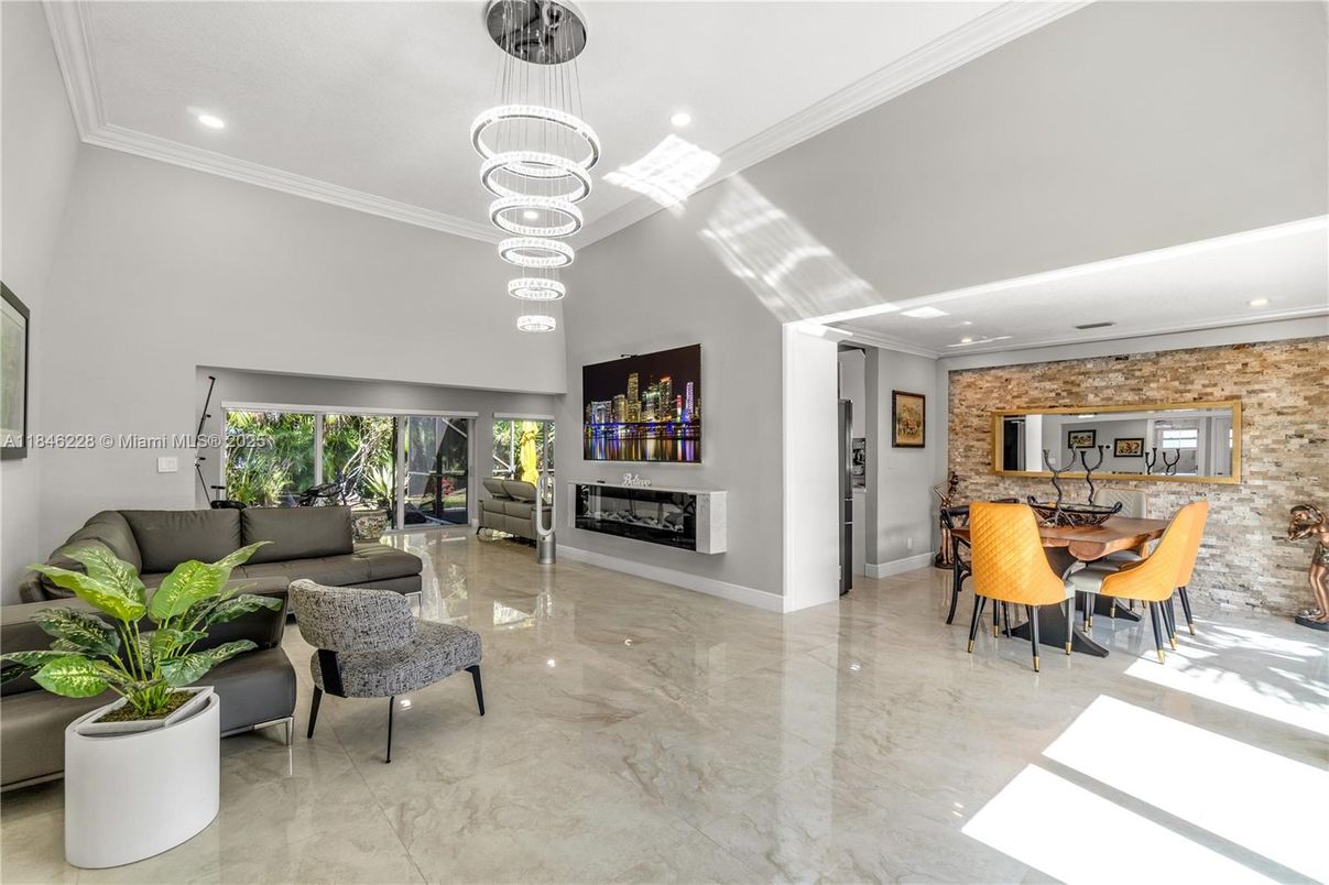 Dining room, Fireplace, Interior, Living room, Marble, Pendant Lights, Recessed Lighting, Stone Walls