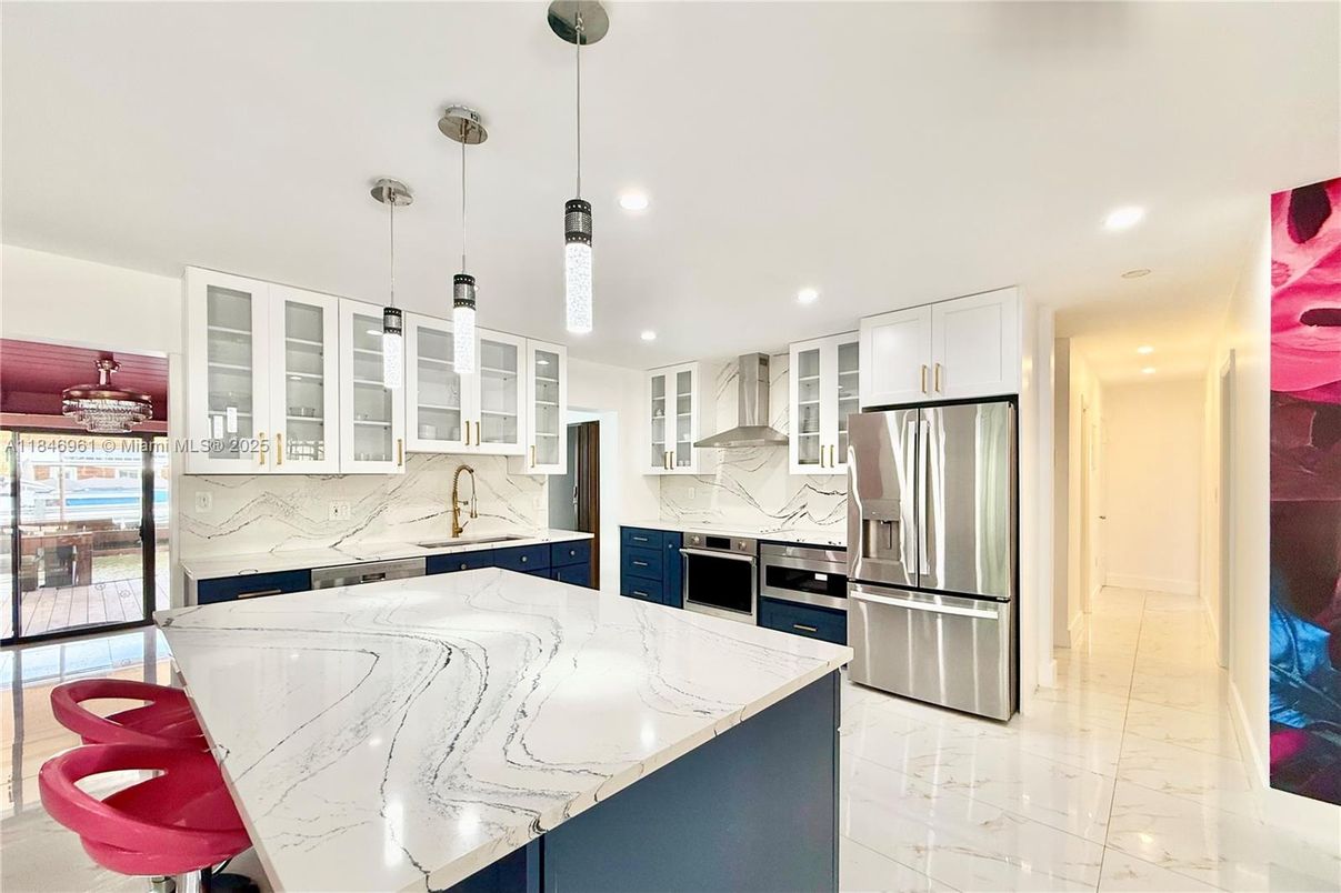 Interior, Kitchen, Marble, Marble Walls, Pendant Lights, Recessed Lighting, Stainless Steel Appliances