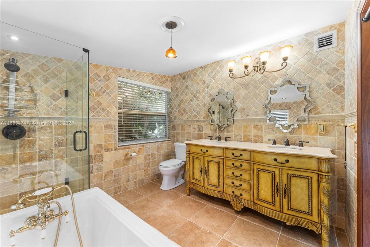 Bathroom, Dual Sink Vanities, Glass Shower, Interior, Recessed Lighting, Stone Walls