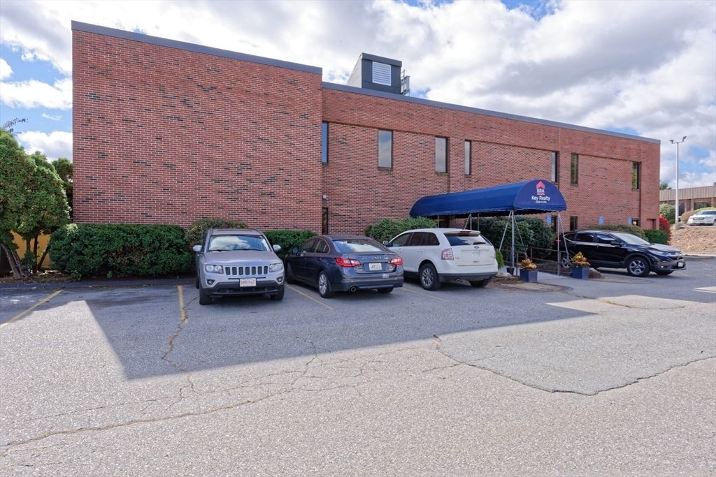 Exterior, Facade, Brick Facade, Condo Building