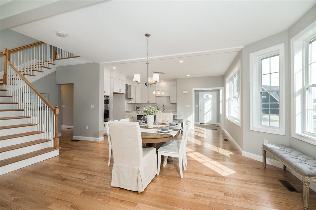 Chandelier, Dining room, Interior, Kitchen, Pendant Lights, Recessed Lighting, Stainless Steel Appliances, Wood Texture Flooring