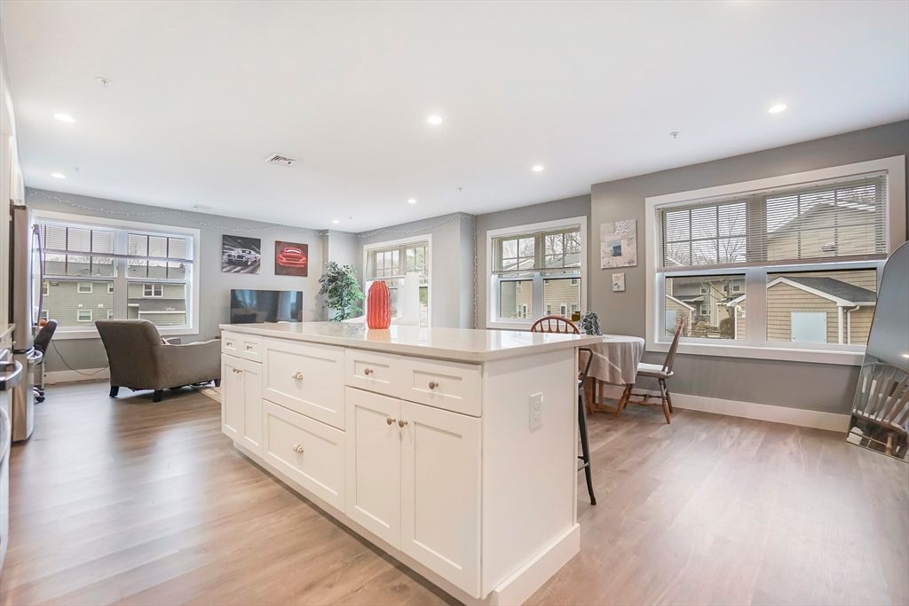 Dining room, Interior, Kitchen, Recessed Lighting, Stainless Steel Appliances, Wood Texture Flooring