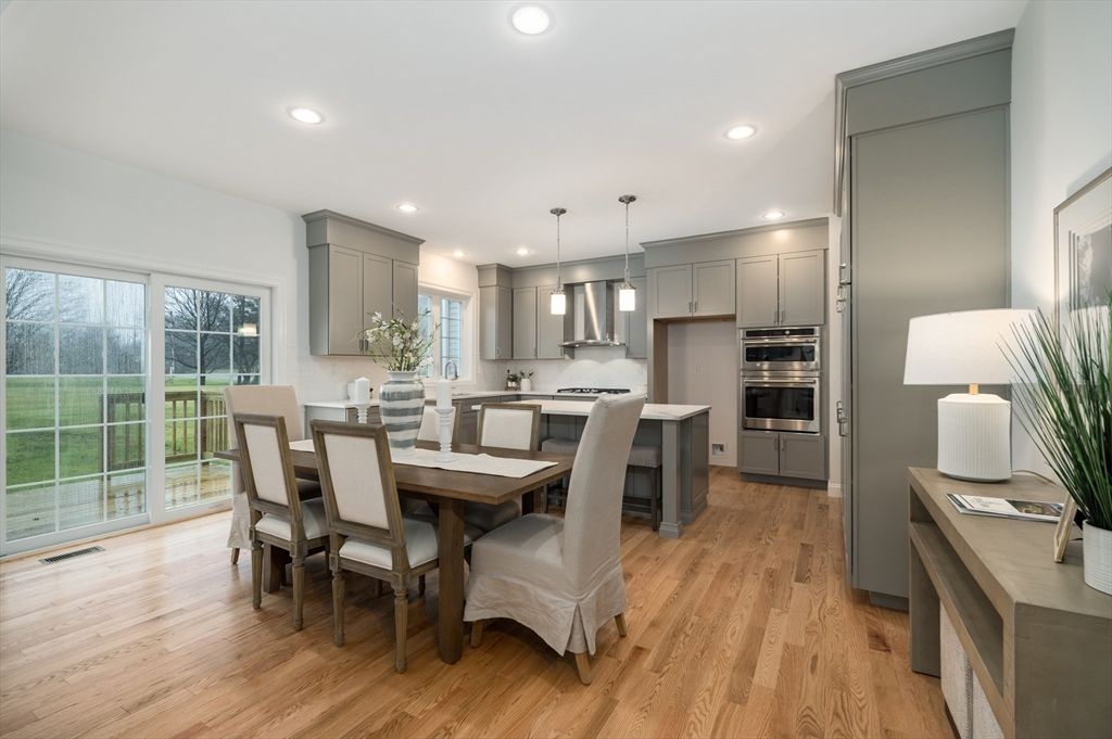 Dining room, Interior, Kitchen, Pendant Lights, Recessed Lighting, Stainless Steel Appliances, Wood Texture Flooring