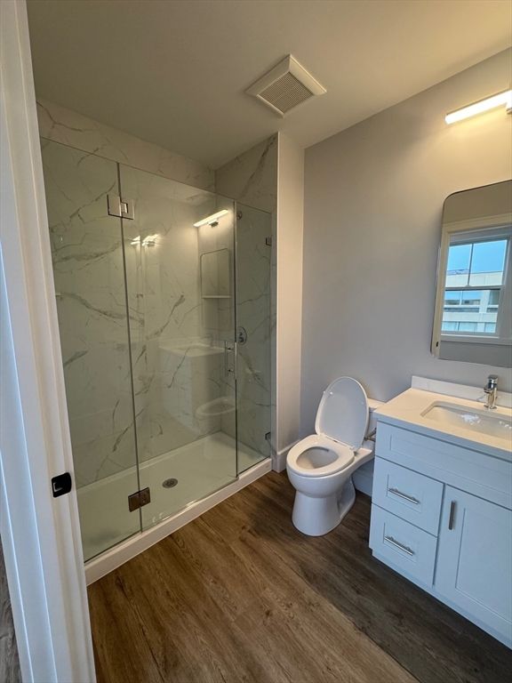 Bathroom, Glass Shower, Interior, Marble Walls, Wood Texture Flooring