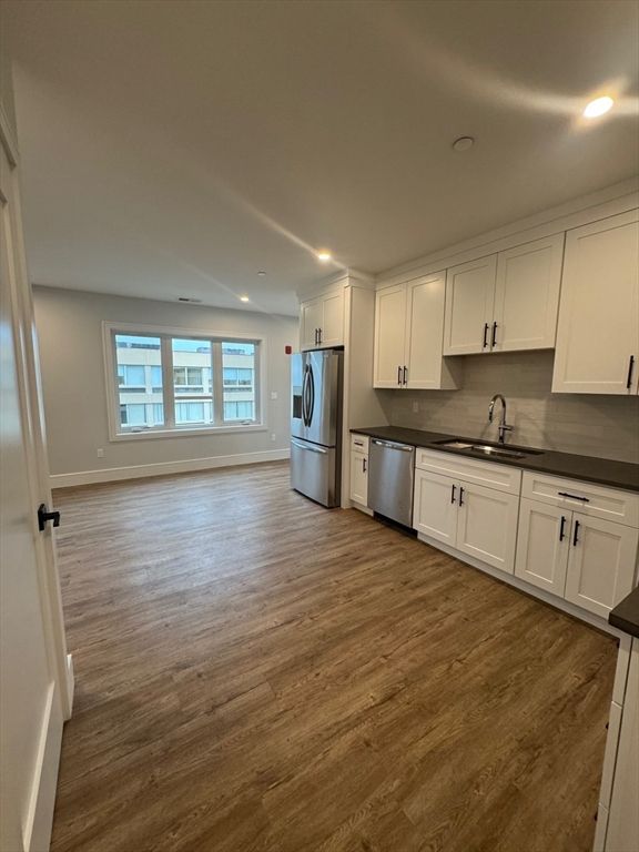 Interior, Kitchen, Recessed Lighting, Stainless Steel Appliances, Wood Texture Flooring