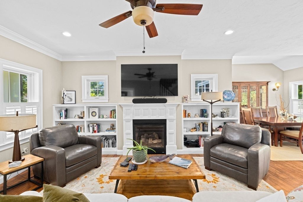 Dining room, Fireplace, Interior, Living room, Recessed Lighting, Wood Texture Flooring
