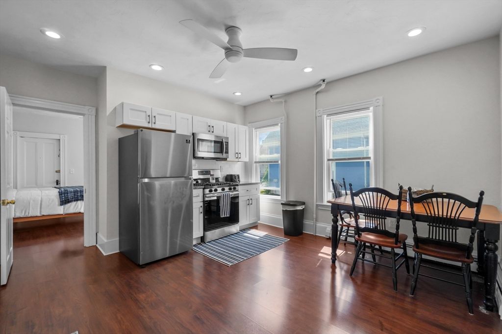 Dining room, Interior, Kitchen, Recessed Lighting, Stainless Steel Appliances, Wood Texture Flooring