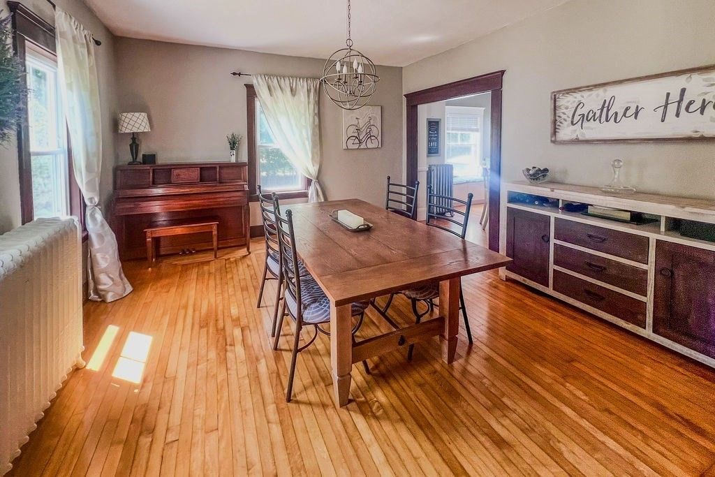 Dining room, Interior, Pendant Lights, Piano, Wood Texture Flooring