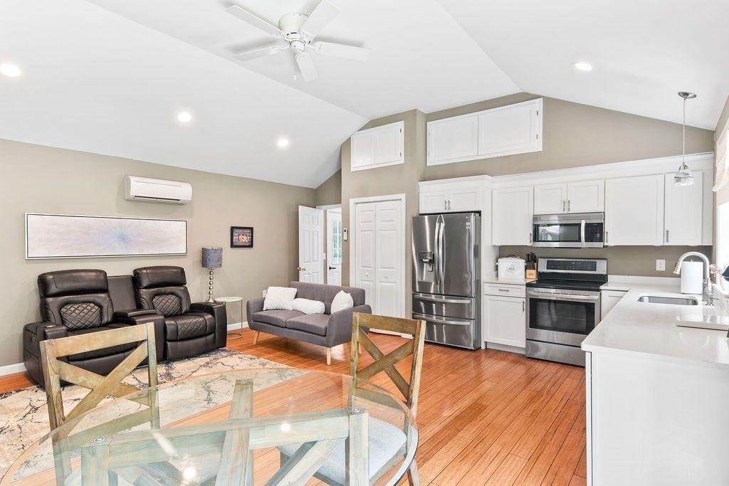 Dining room, Interior, Kitchen, Living room, Pendant Lights, Recessed Lighting, Stainless Steel Appliances, Wood Texture Flooring