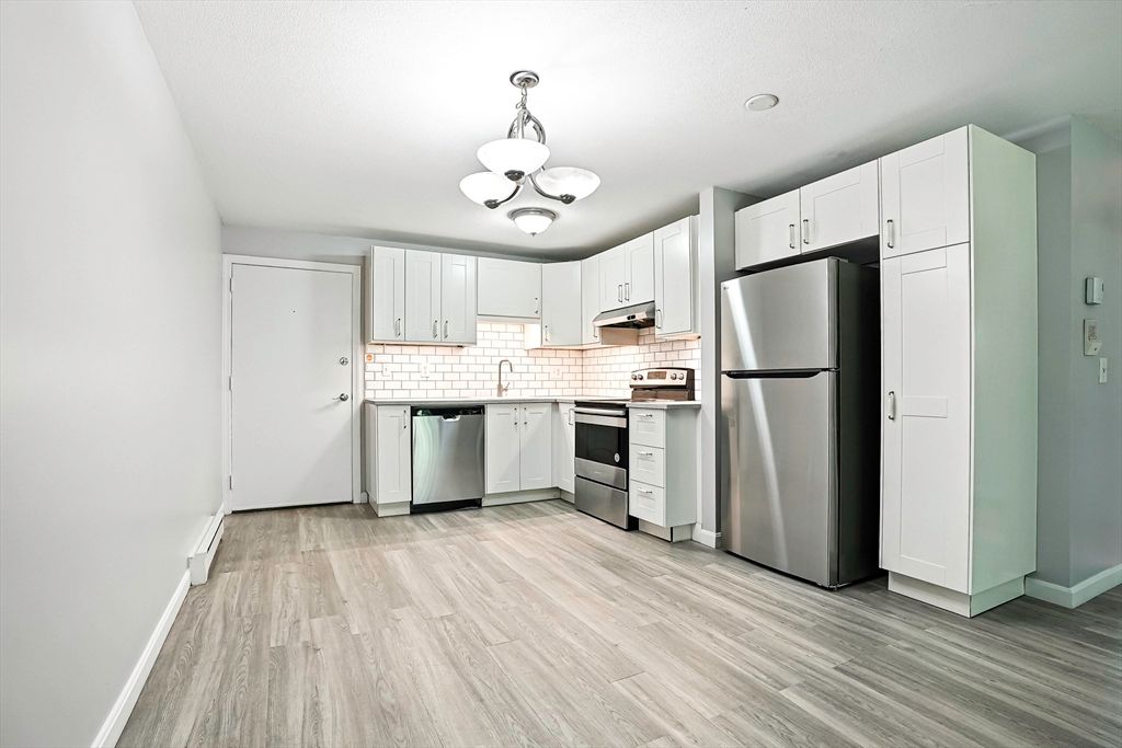 Interior, Kitchen, Pendant Lights, Stainless Steel Appliances, Wood Texture Flooring