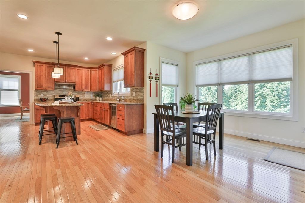 Dining room, Interior, Kitchen, Pendant Lights, Recessed Lighting, Stainless Steel Appliances, Wood Texture Flooring