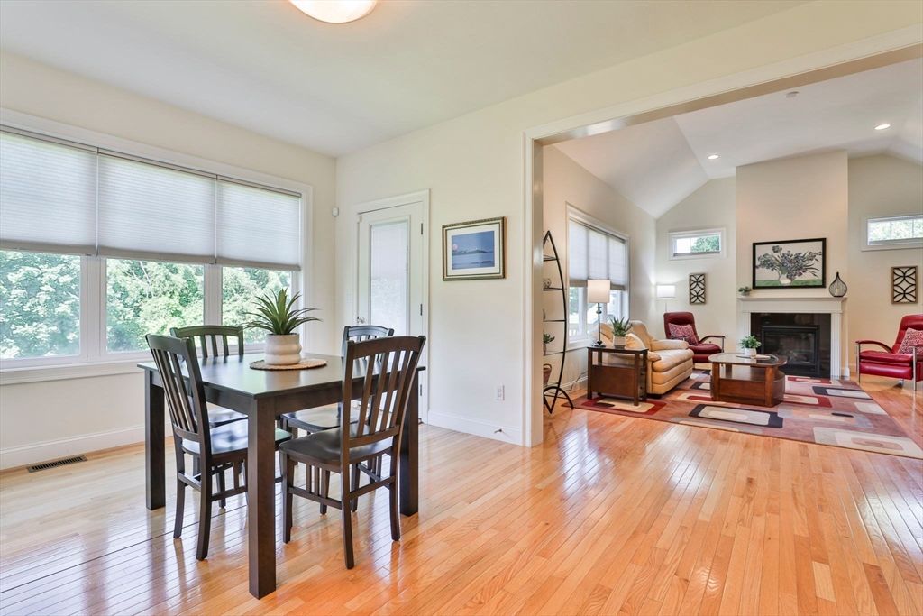 Dining room, Fireplace, Interior, Living room, Recessed Lighting, Wood Texture Flooring