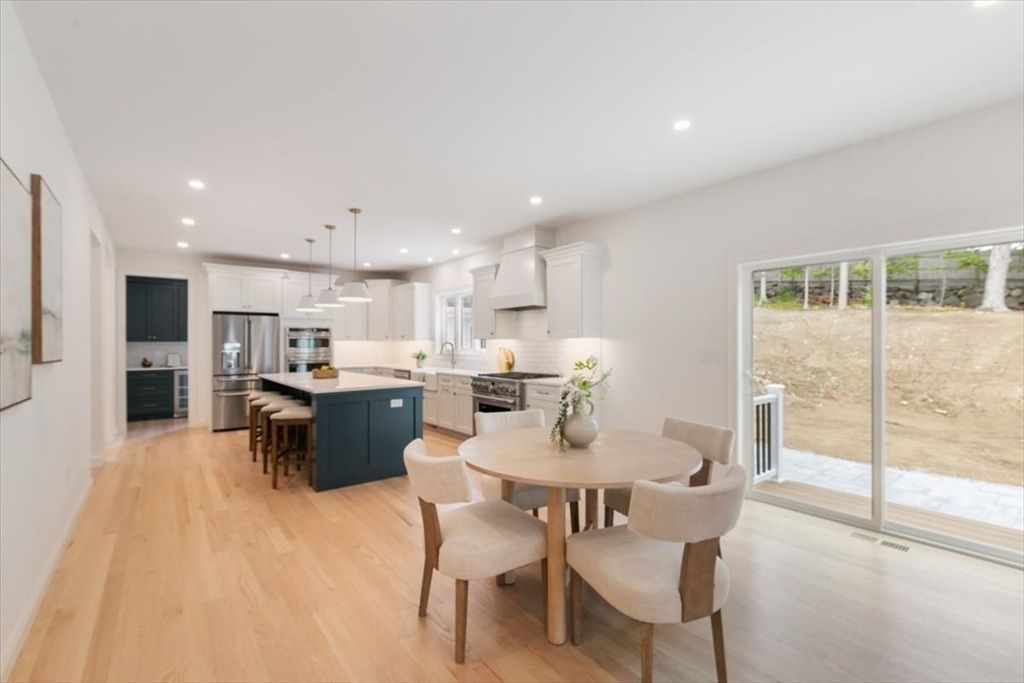 Dining room, Interior, Kitchen, Pendant Lights, Recessed Lighting, Stainless Steel Appliances, Wood Texture Flooring