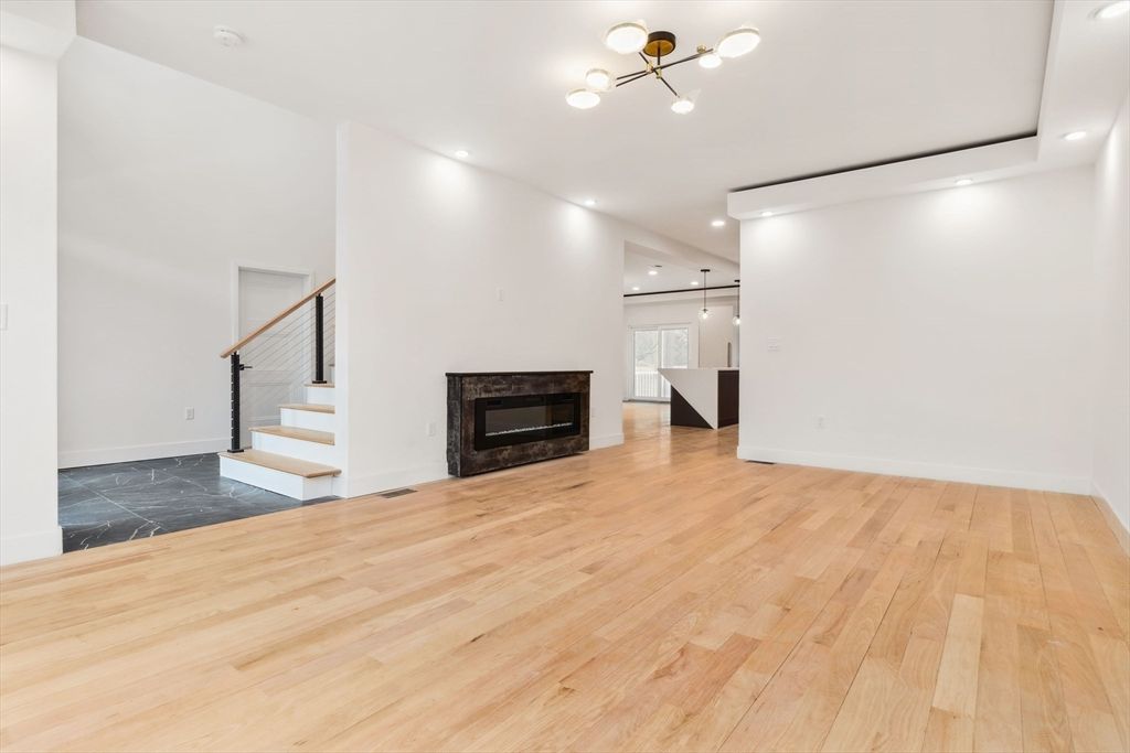 Empty room, Fireplace, Interior, Pendant Lights, Recessed Lighting, Wood Texture Flooring
