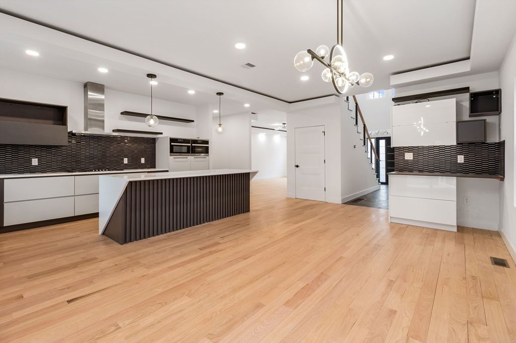 Interior, Kitchen, Pendant Lights, Recessed Lighting, Stainless Steel Appliances, Wood Texture Flooring