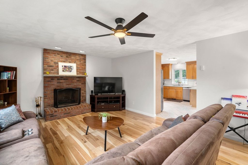 Fireplace, Interior, Kitchen, Living room, Recessed Lighting, Stone Walls, Wood Texture Flooring